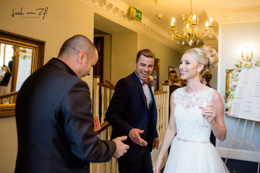 Magician entertaining bride and groom at Parklands Quendon Hall Essex